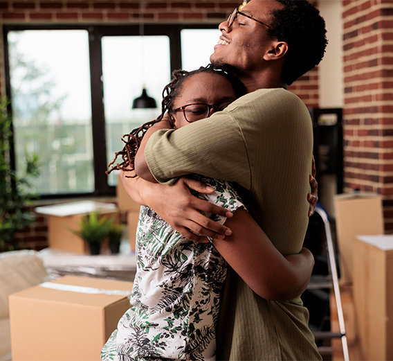 Couple that's new to Canada enjoying their new home